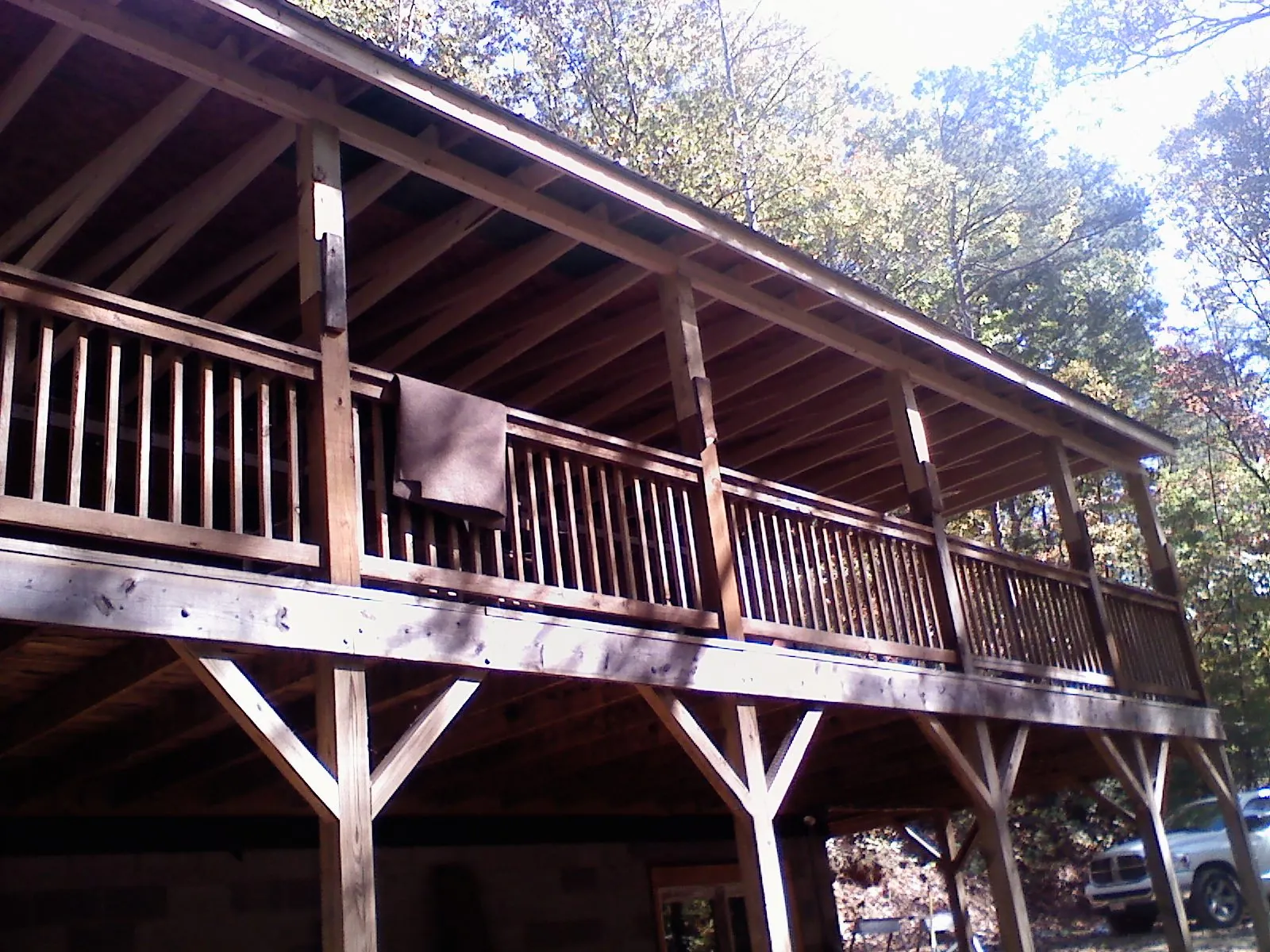 Timber framing under a new elevated porch and deck — Roof Leak Repair in Kennedale by Roofing Brothers